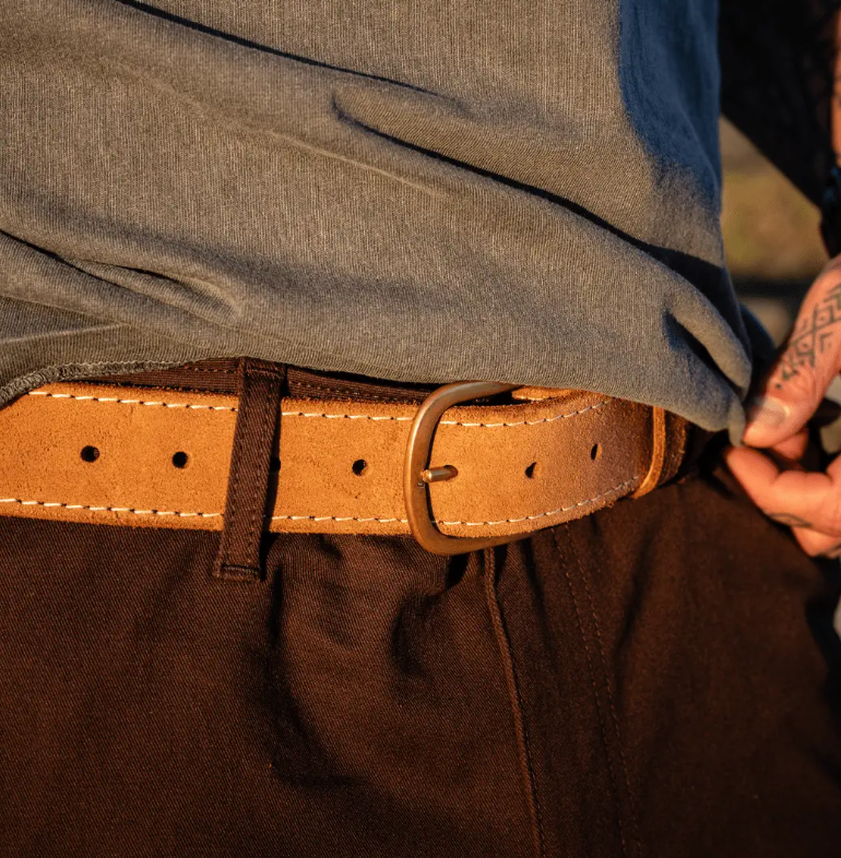 Brown roughout leather belt worn with dark work trousers