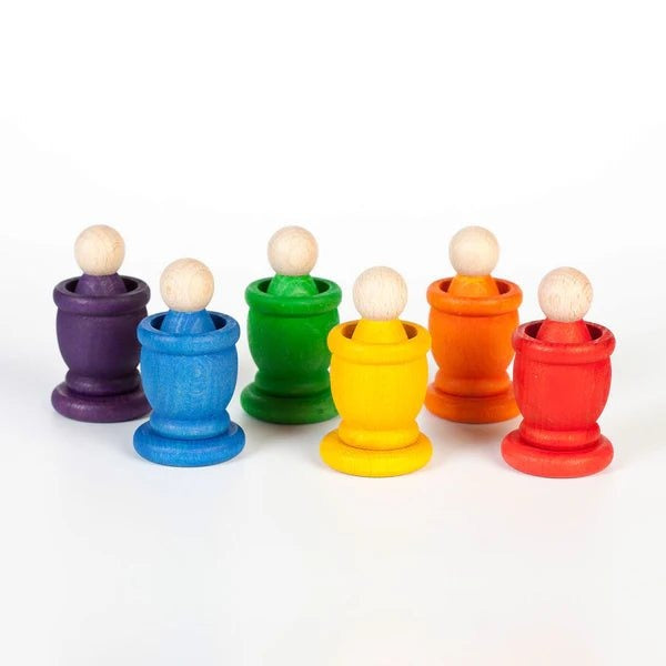Grapat colorful Nins figures seated in matching wooden cups