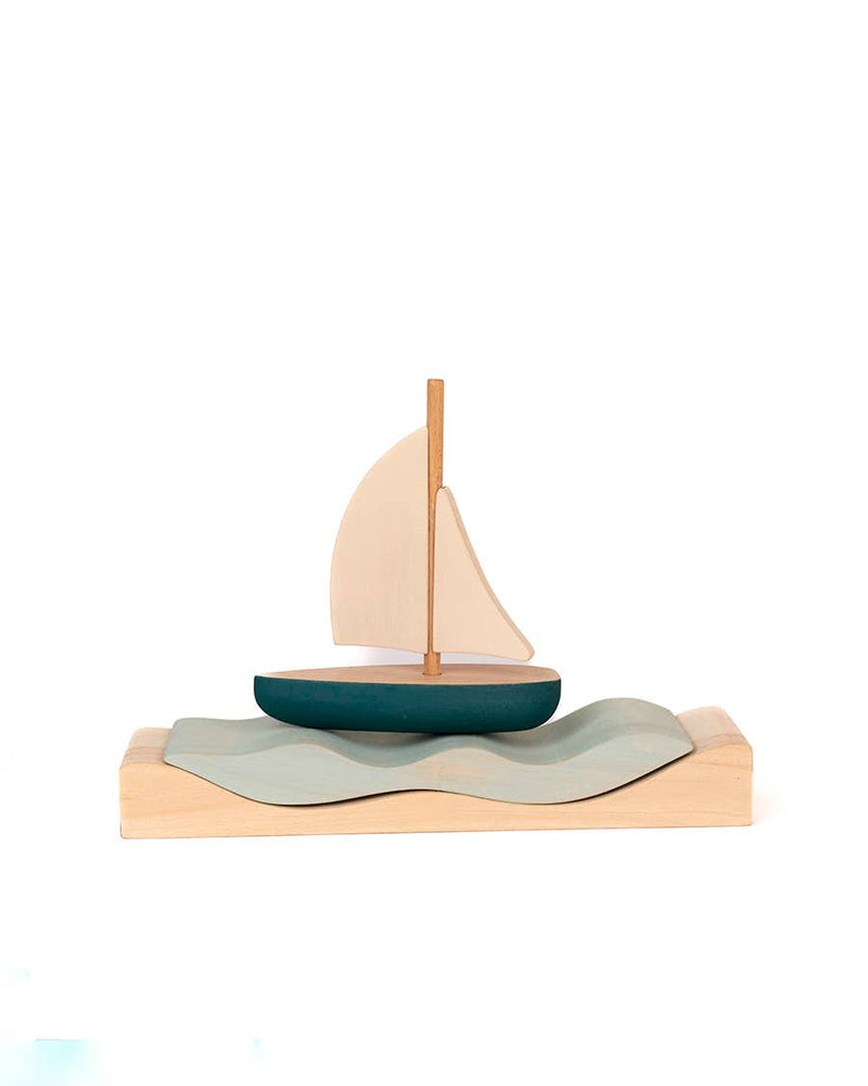 SABO Quiet Journey teal sailboat on the pale-blue wave platform