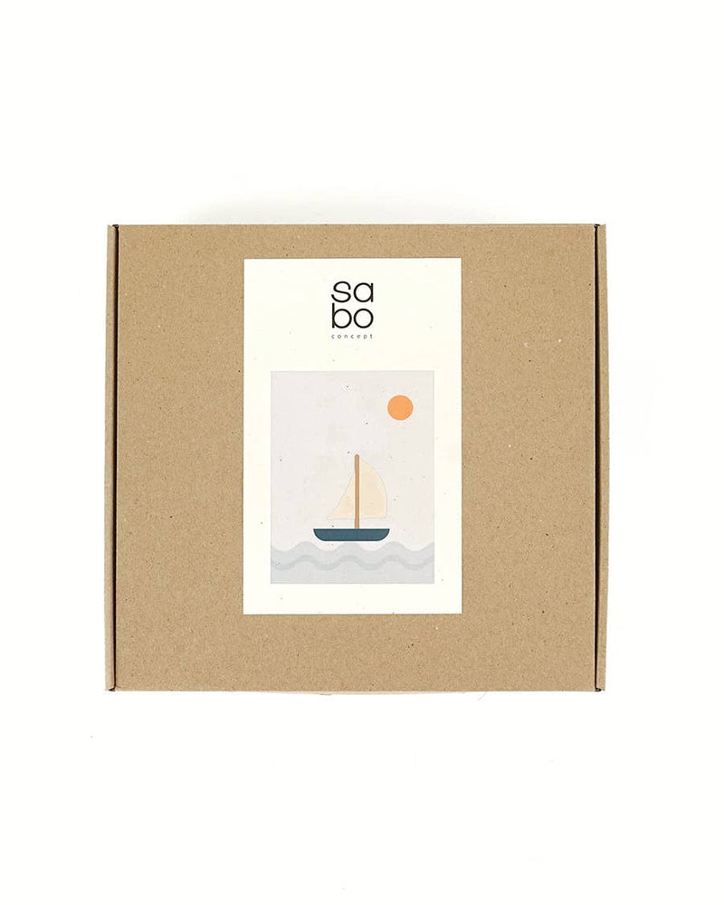 SABO Quiet Journey kraft box with sailboat illustration