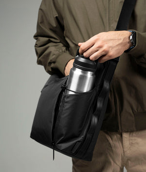 Flow Satchel | 10L Curved Crossbody | Padded Laptop Sleeve | Recycled Ripstop