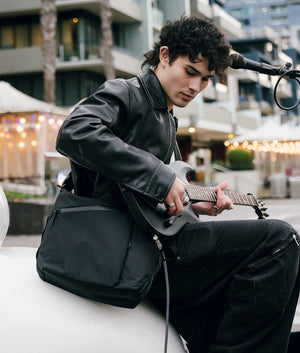 Flow Satchel | 10L Curved Crossbody | Padded Laptop Sleeve | Recycled Ripstop