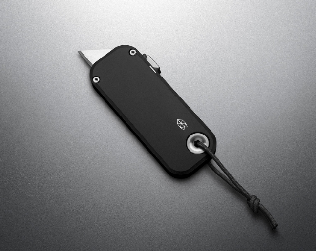 The Palmer utility knife shown in a compact everyday-carry composition