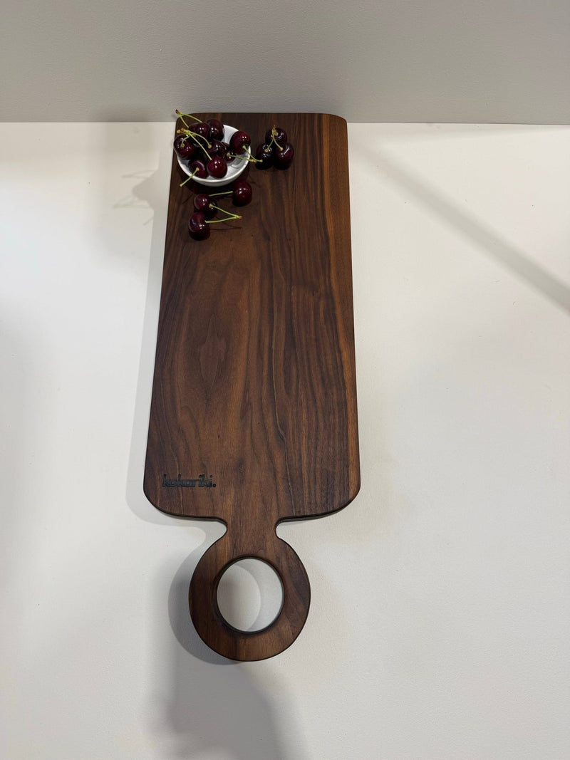 The Halo Serving Board in black walnut — view 1