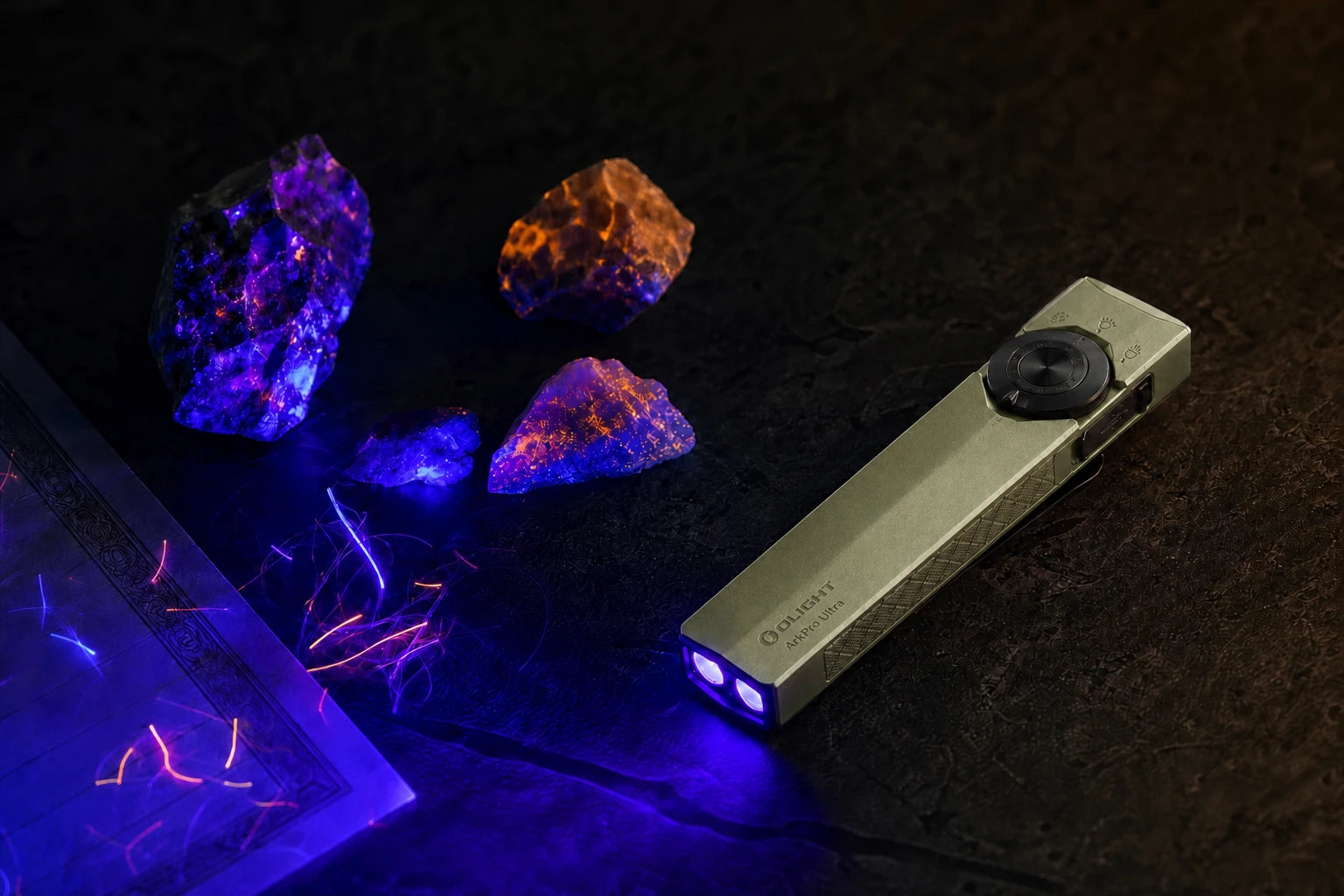 Olive Green ArkPro Ultra revealing fluorescent minerals and security fibers with ultraviolet light
