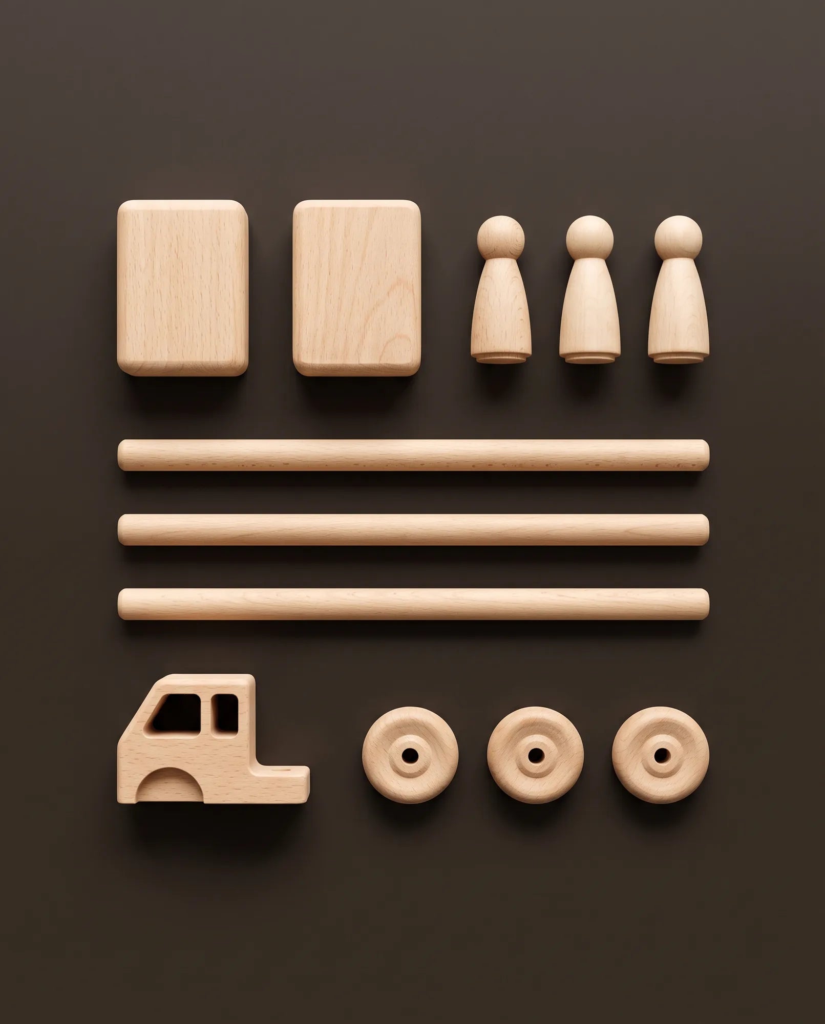 Beech wheels, dowels, blocks and peg figures laid out in rows