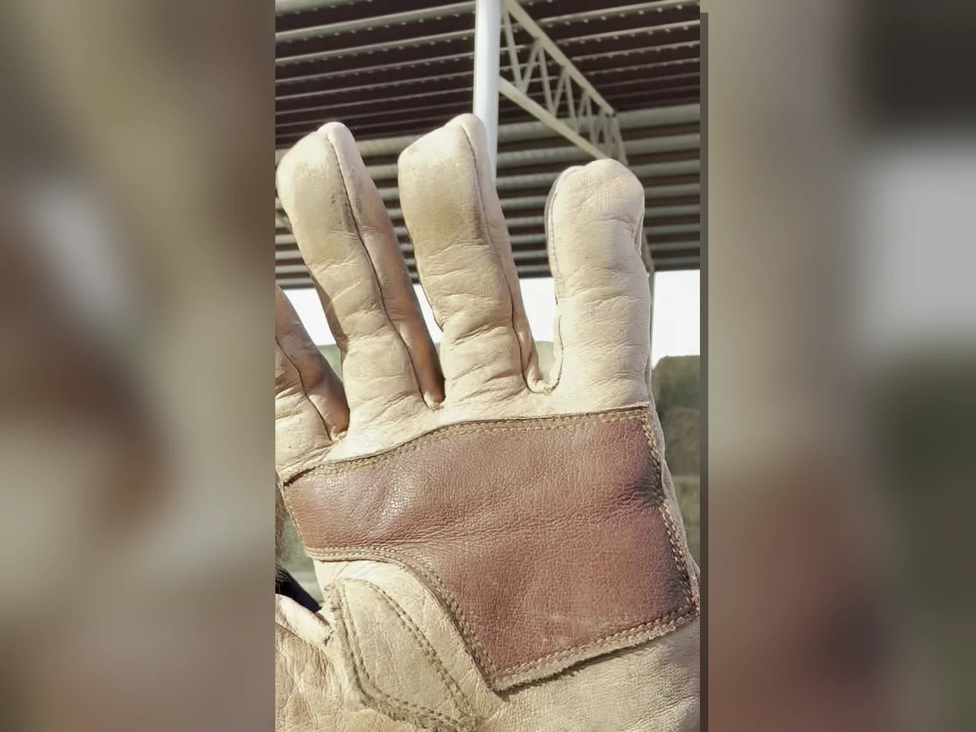 Actual field-worn buffalo leather glove palm with oxblood reinforcement
