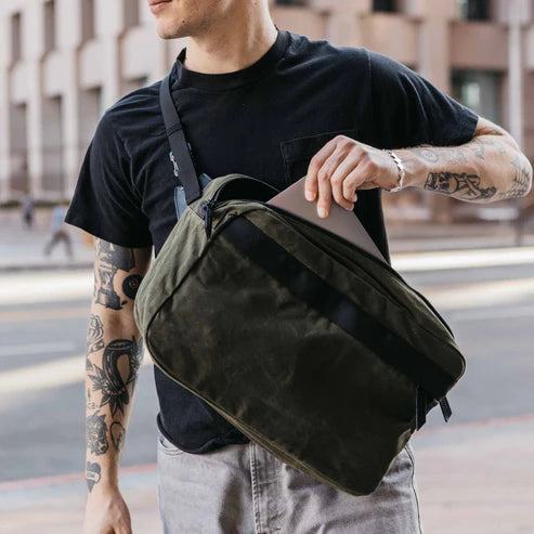 Canyon Crossbody Large worn across the body on a city street