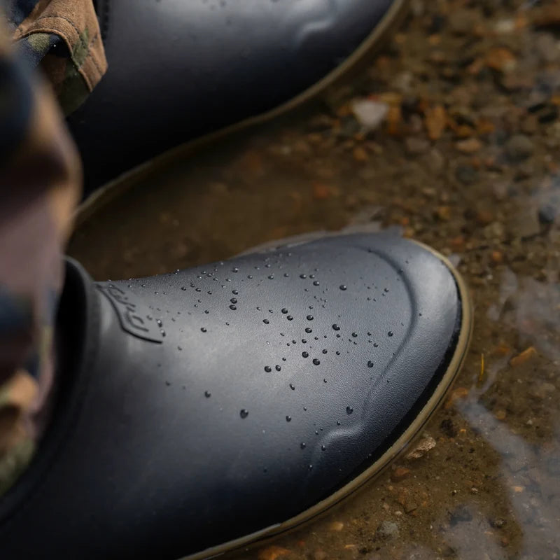 Water beading on the seamless black River Clog upper