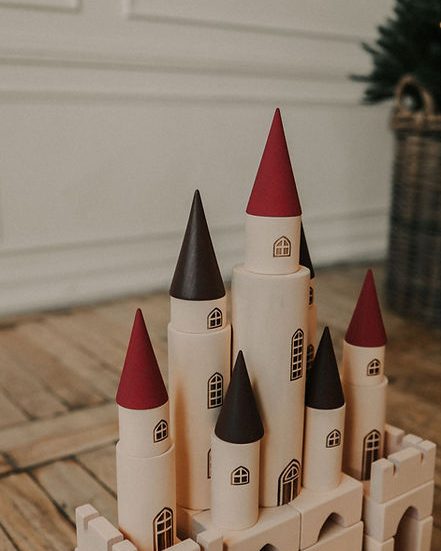 Great Kingdom castle towers with burgundy cone roofs