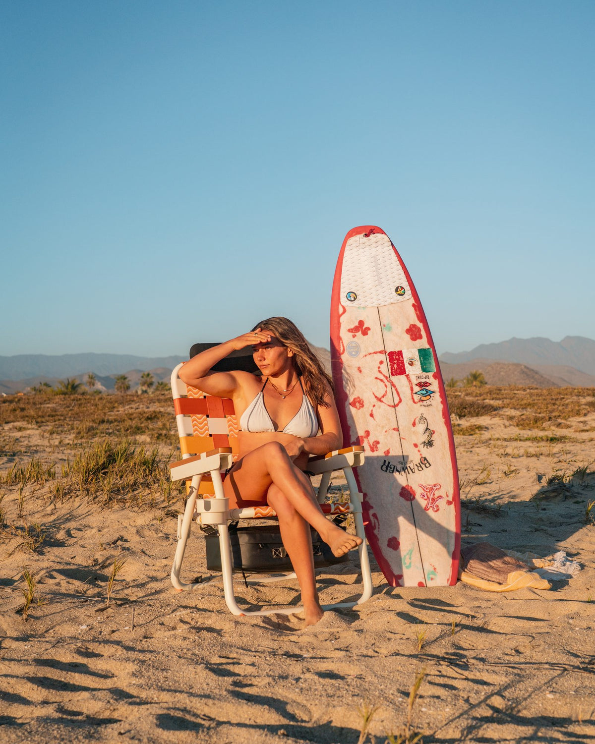 Person sitting in a Sunkissed PARKIT Voyager on the beach