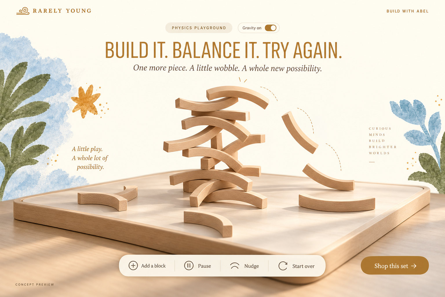 A preview of a virtual tower of curved wooden blocks with pieces tumbling beside it